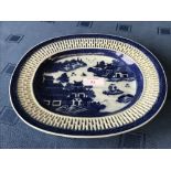 Blue and white willow pattern shallow dish with pierced rim, 24x21cm