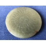 Chinese green jade circular disk with concentric decoration, 7cm dia
