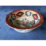 Chinese Imari pattern circular dish decorated with figures & panels, 21cm dia