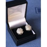 Pair of 14 carat white gold diamond cluster earrings of 6.6 carats
