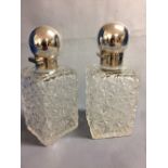 Pair of Victorian square glass cologne bottles with hallmarked silver hinged lids, Sheffield 1892+3