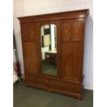 Edwardian mahogany & satinwood inlaid double wardrobe with central mirror & 2 single drawer base,