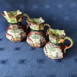 A graduated set of 3 Mason's ironstone jugs, decorated with Chinese scenes