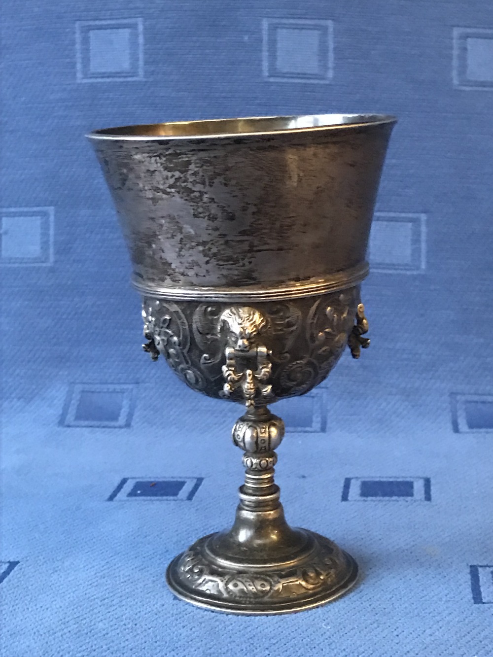 Hallmarked silver wine goblet in Elizabethan style with lion mask rings & chase decoration by Wakely