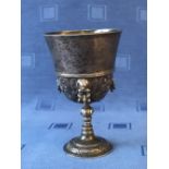 Hallmarked silver wine goblet in Elizabethan style with lion mask rings & chase decoration by Wakely