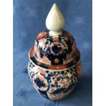 An Imari ovoid vase & cover, 26cmH