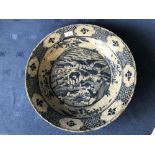 Chinese blue and white circular crazed dish decorated with scenes of animals & flowers with
