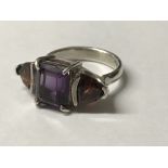 Sterling silver 3 stone ring, size L 1/2 claw set with amethyst & garnet