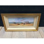 An extensive oil painting depicting a Victorian beach scene with figures and steam ship offshore,