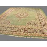 Rare C19th Indian Agra carpet, with all over light green ground with cream, beige and red