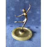 A Lorenzi style dancing nude lady mounted on onyx dish, 22cmH