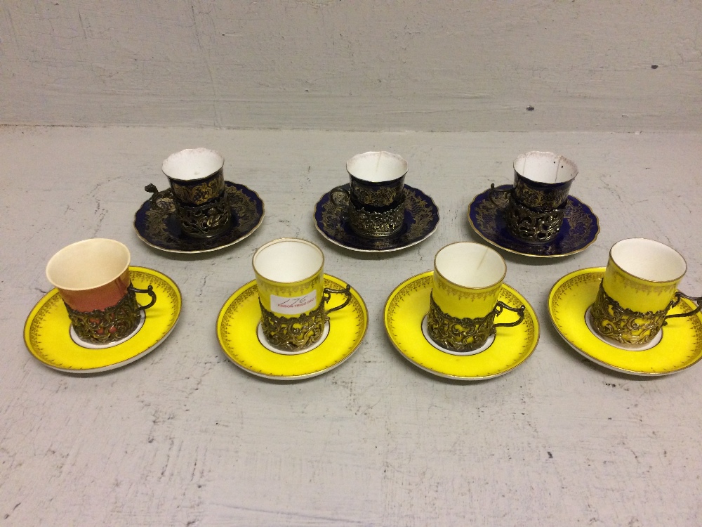 Set of 5 hallmarked silver coffee cup holders by G & S Co. Ltd. of London & 2 various silver