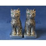 Pair of cat condiments stamped 800 Continental silver with emerald eyes