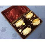 Cased set of 4 hallmarked silver embossed table salts & spoons
