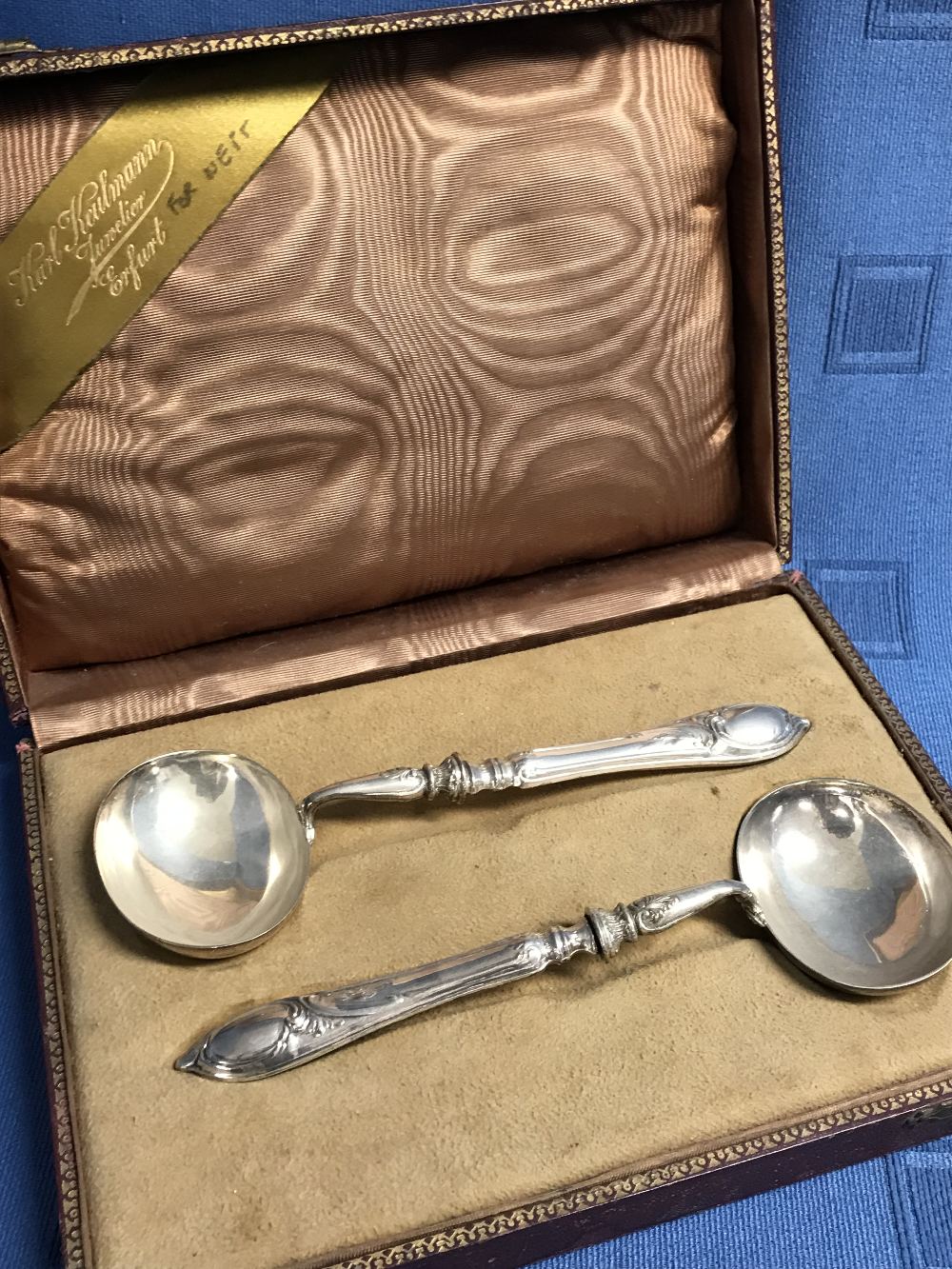 Cased pair of Continental silver ladles