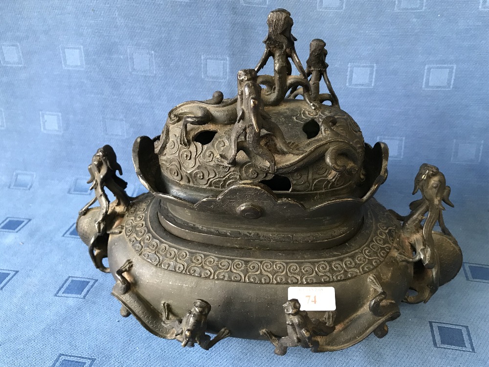 Chinese bronze censer on a stand, with lid decorated with dragons & mythical figures, 36cmL