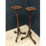 Pair of good quality Regency style torcheres, the fluted pedestals on a scrolling tripod base, the
