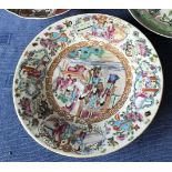 Chinese famille rose circular shallow dish entirely decorated with scenes of figures & flowers, 26cm
