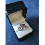 Sterling silver 3 stone tapered bombe ring set with cabochon Pink Tourmaline, finger size O