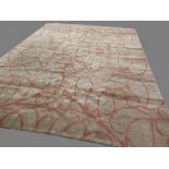 Contemporary modernist rug, with all over beige ground and red circular all over patterns, 2.38x1/