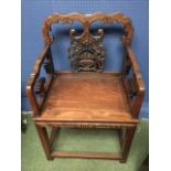 Chinese hardwood throne type chair with pierced back on block legs