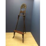 Chinese carved hardwood easel, profusely decorated with prunus 218cmH