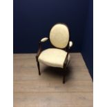 Victorian mahogany framed armchair upholstered in cream floral fabric