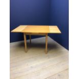 Contemporary pine effect extending dining table
