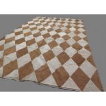 Contemporary suede type rug with all over diamond pattern in biscuit and fawn colours