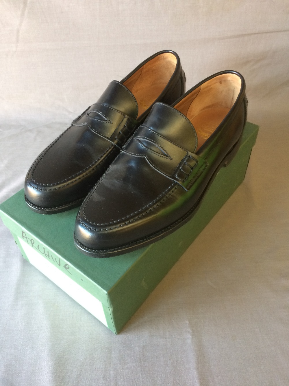 Pakeman, Catto & Carter black leather penny loafers, size 9 (as new) (Provenance: Pakeman's Gents