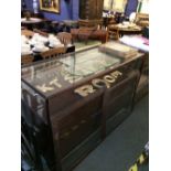 Edwardian oak & glass shop display counter 92 CM HIGH x 153 cm LONG (Provenance: Pakeman's Gents Ou