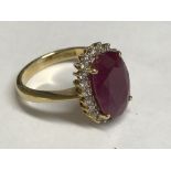 18 carat yellow gold, ruby & diamond cluster ring of 4.6 carats