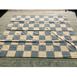 Contemporary rug with overall square designs in blue and fawns 298 x 251 cm