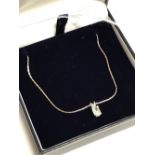 White gold, emerald cut diamond pendant necklace of 70 points approx, colour /M, clarity Si