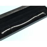 14 carat white gold diamond tennis bracelet of 8.2 carats made up of 43 diamonds