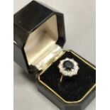 Diamond and sapphire cluster, 18 carat yellow gold ring, size O, 4.5g