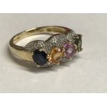 14 carat yellow gold Tutti Fruity ring, set with sapphire, citrine, amethyst & peridot with