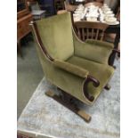 Unusual C19th gentleman's mahogany show framed library chair with scrolling arms, scrolling supports