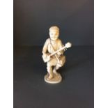 Carved C19th ivory, Chinese figure of a musician, 23cmH