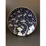 Large Chinese blue & white dish with cherry tree decoration, 41cm diam