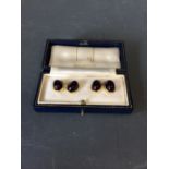 Pair of 18 carat gold cabochon set amethyst cufflinks, boxed
