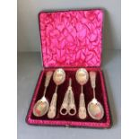 Cased set of good quality silver plated open work grape scissors & 4 table spoons with waterfowl