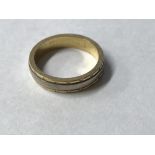 18 carat white and yellow gold wedding band, size I