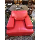 Contemporary red leather armchair on chrome feet