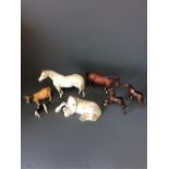 5 Beswick horse figures & 2 Beswick cow figures