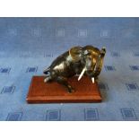 Bronze study of a rearing bull elephant on a wooden stand, 18cmH overall