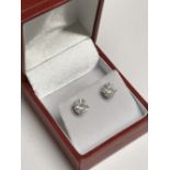 Pair of 18 carat white gold diamond stud earrings of 2.2 carats, colour of H/J, clarity Si