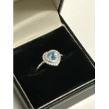 9 carat white gold heart shaped aquamarine & diamond ring