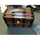 Wooden and leather bound domed trunk