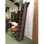 2 antique library ladders & 1 normal ladder (Provenance: Pakeman's Gents Outfitters Shop, formerly